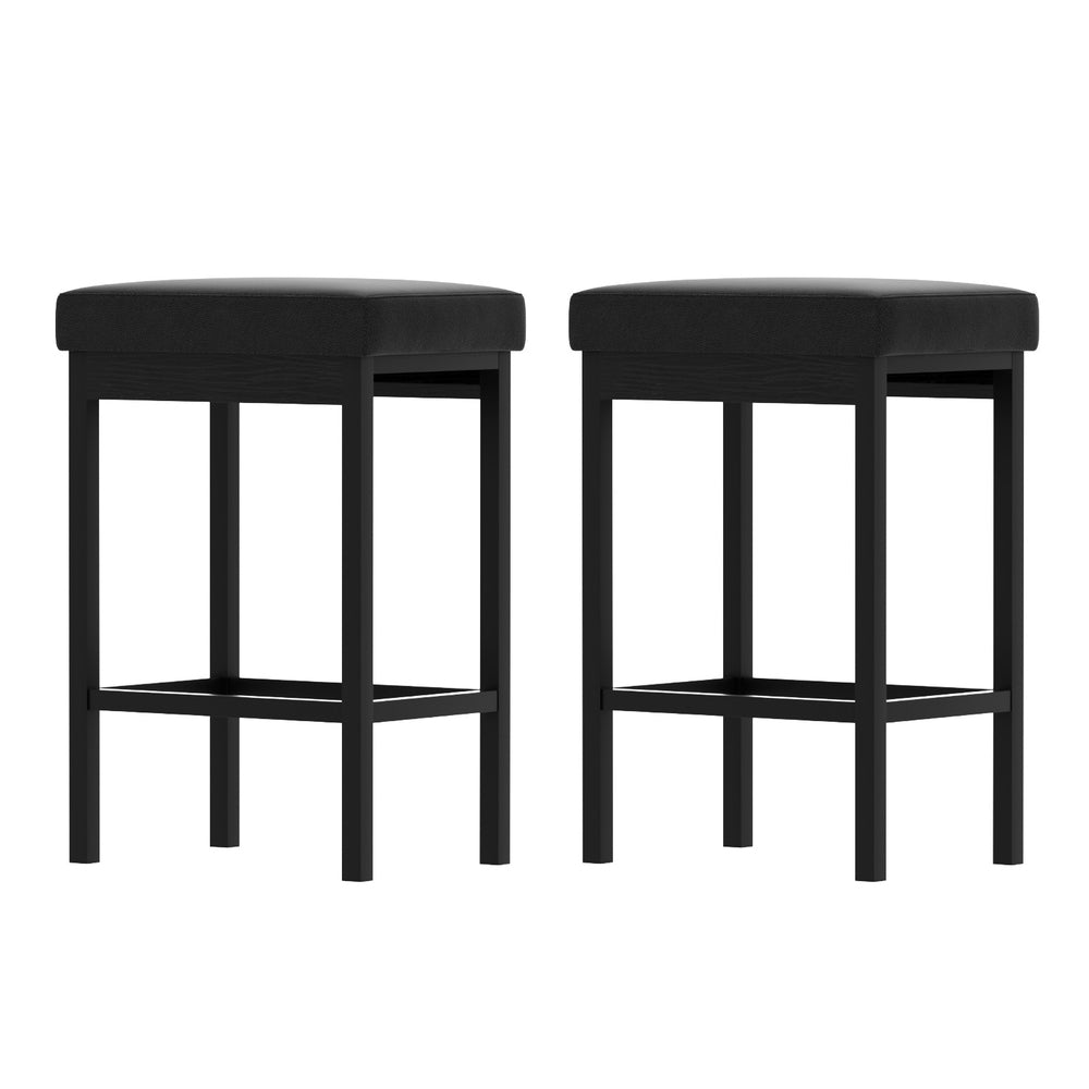 Two black bar stools on a white background