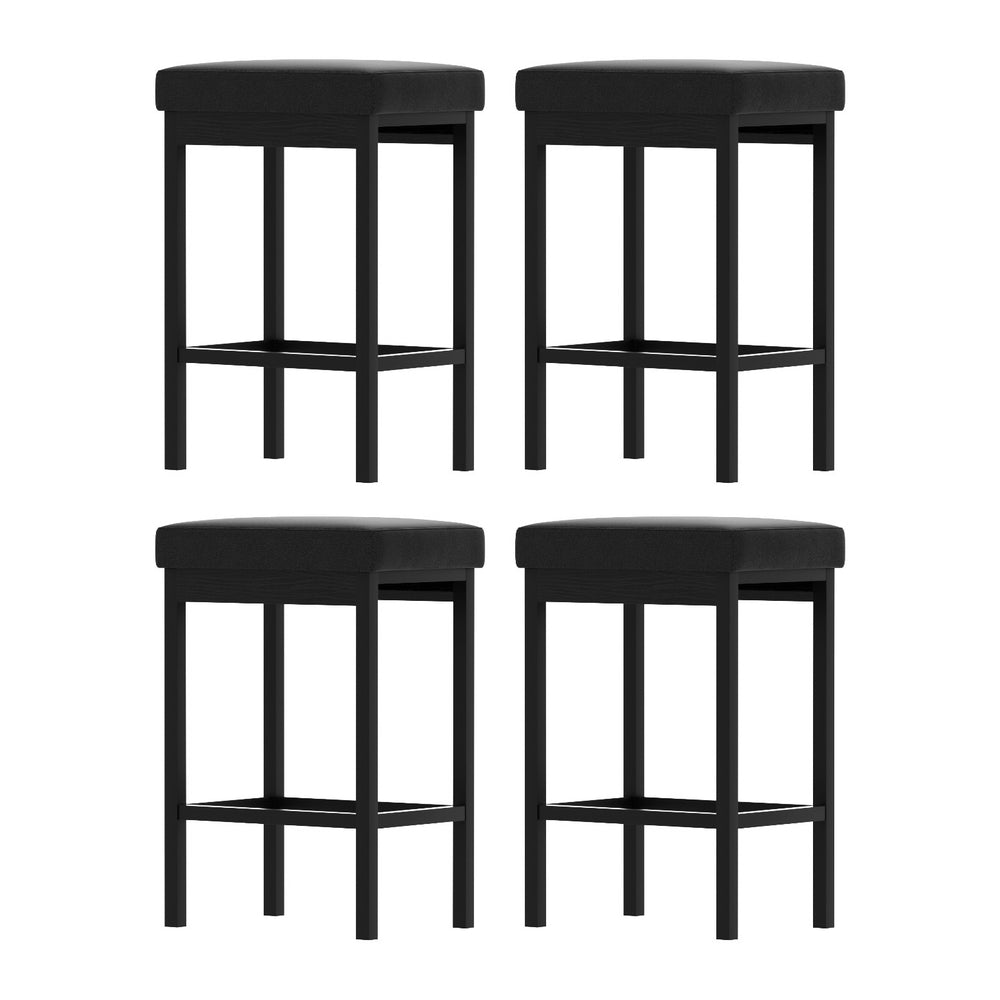 Four black bar stools on a white background