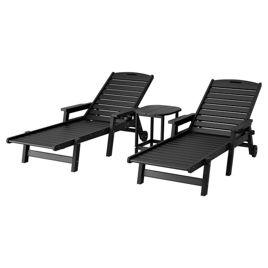 Two black outdoor lounge chairs on a white background