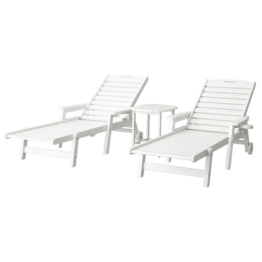 Two white lounge chairs with a small table on a white background