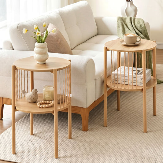 Two wooden side tables in a living room setting with a white sofa and decorative items.